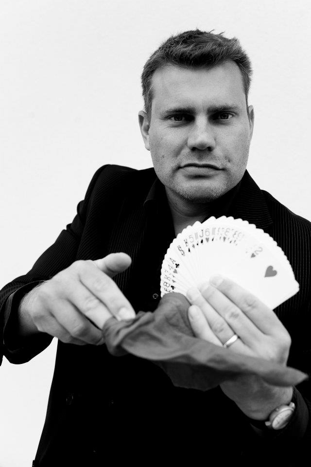 Kenneth performing close-up card magic