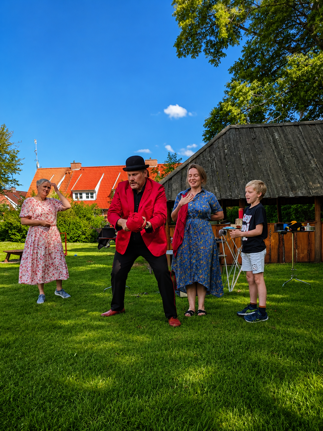 Kenneth performing magic for children and families